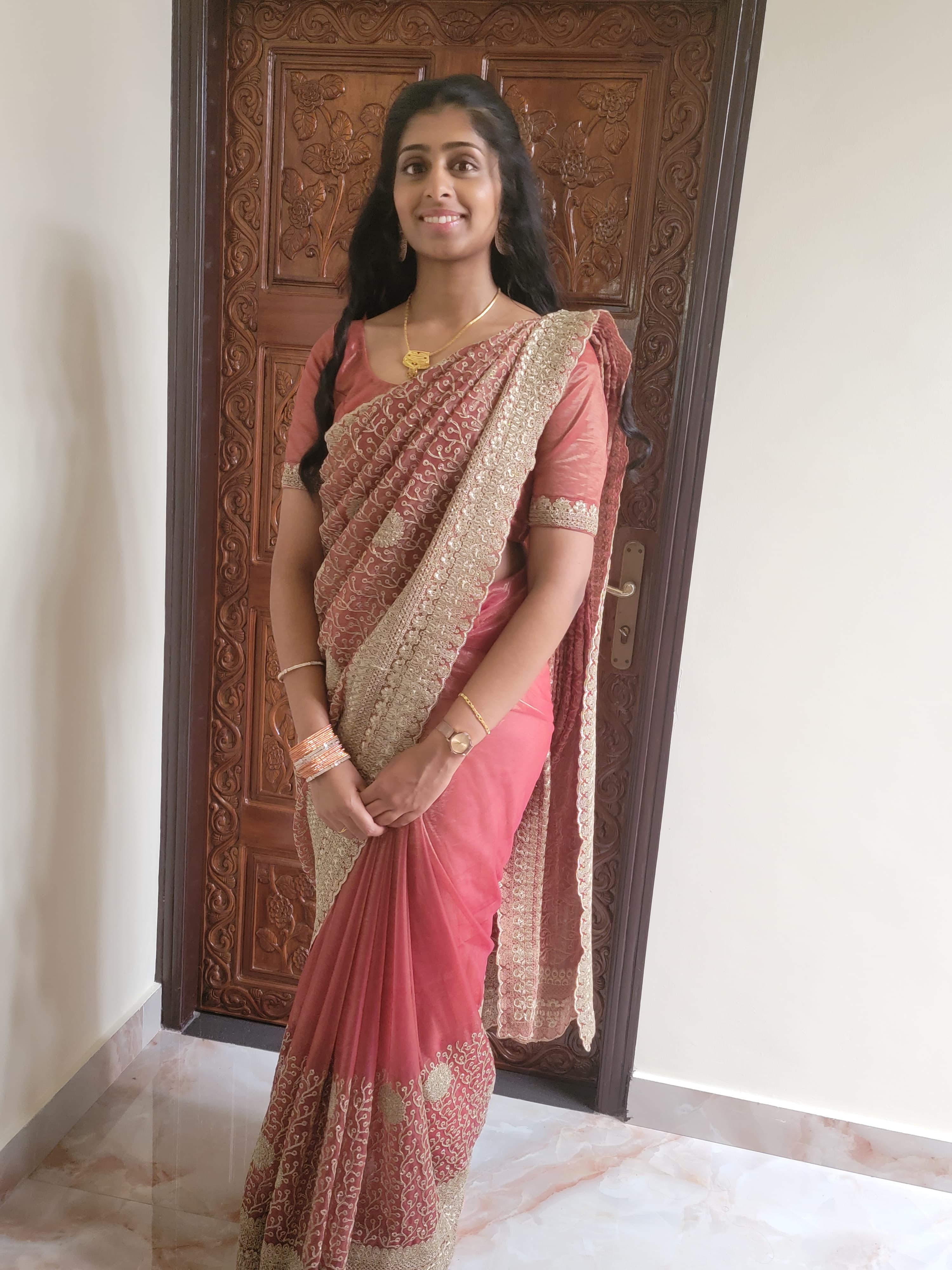 Woman in an elegantly draped saree