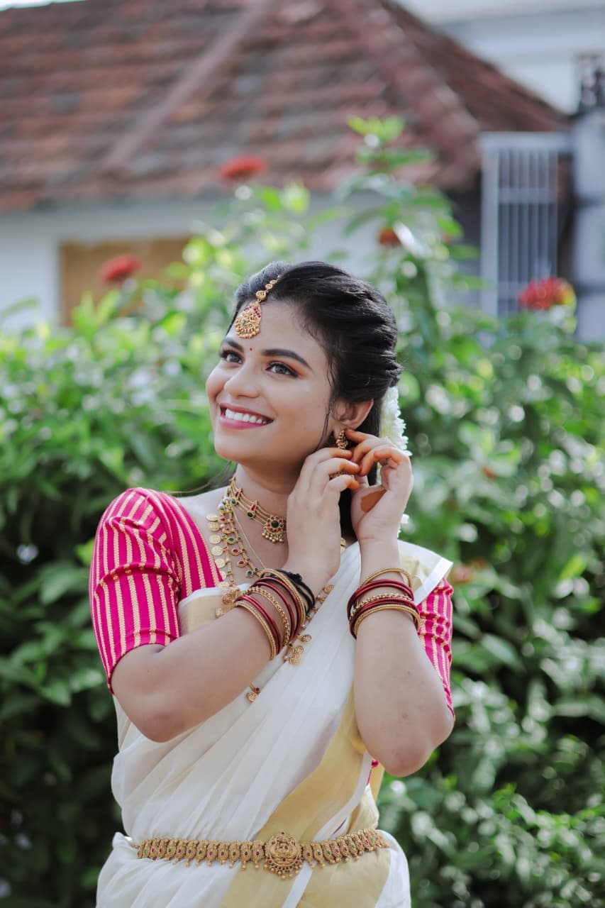 Bride showing her full temple look makeup